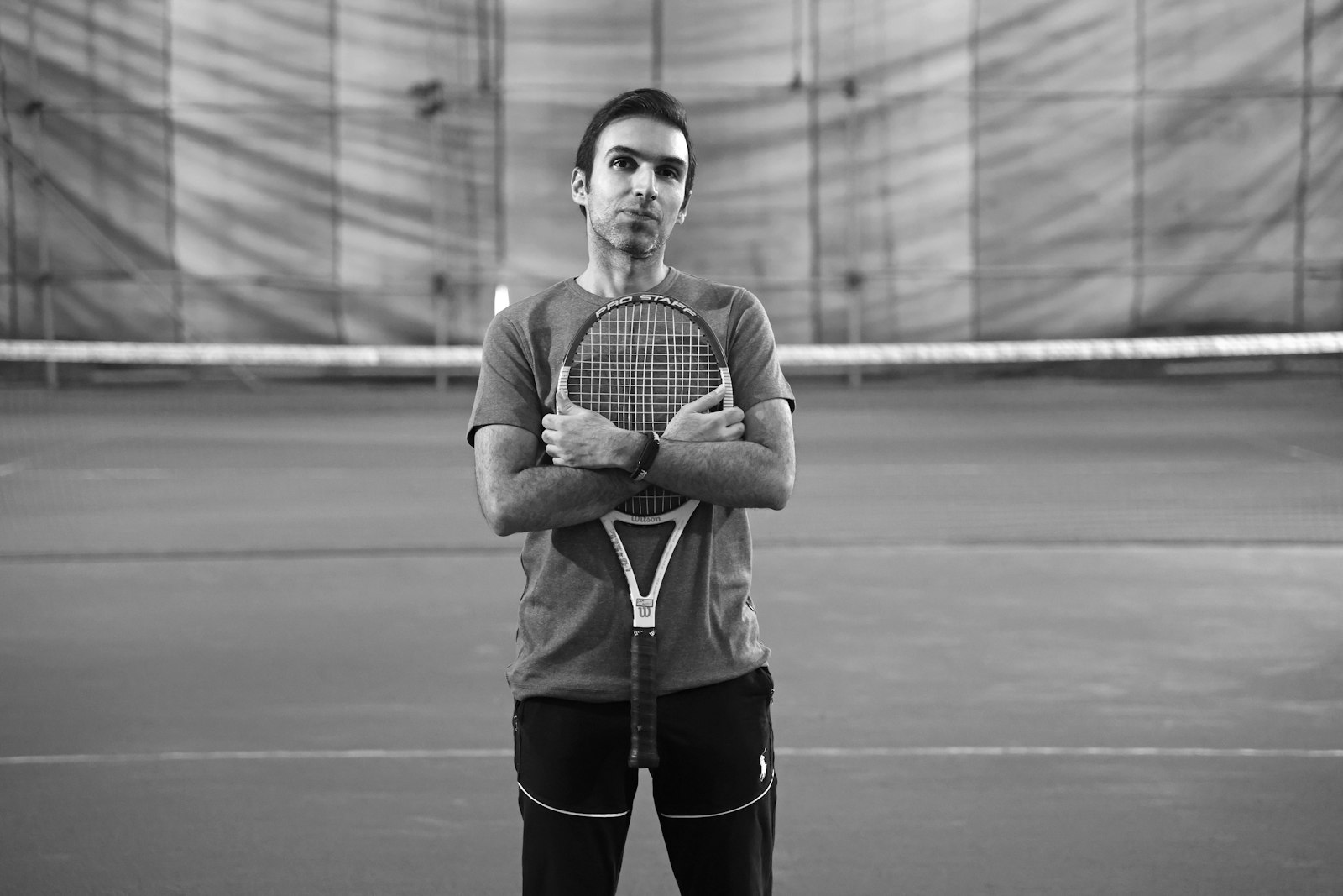 Coach portrait framed on an indoor court